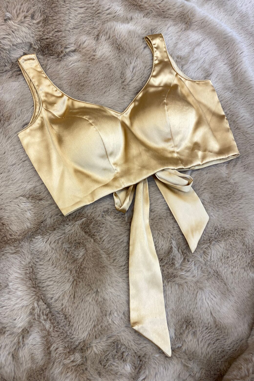 Sleeveless Satin Padded Blouse with Bow Detailling